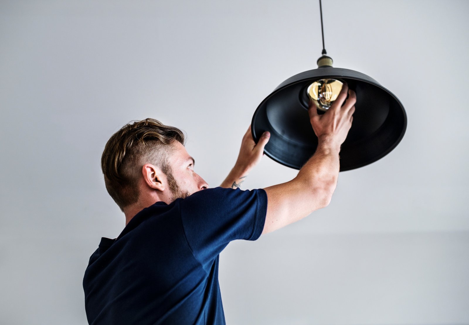 Man changing lightbulb